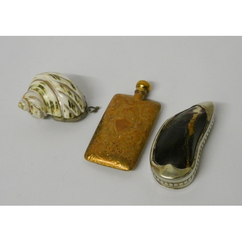 691 - A Victorian gilt metal scent flask with engraved decoration and two white metal mounted shell snuff ... 