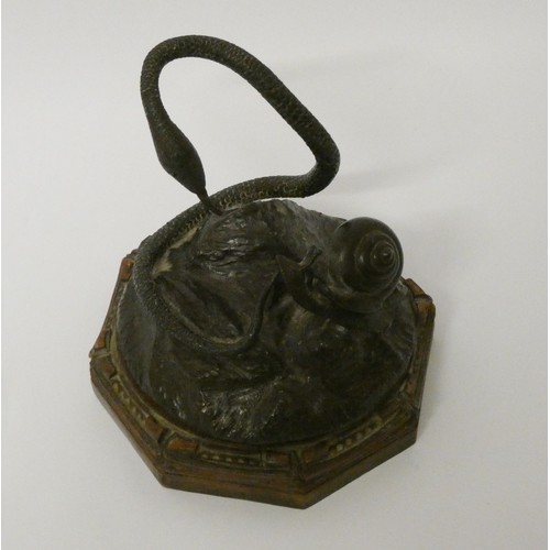 293 - A bronze of a snake and a snail on a hexagonal wooden base, approx 15cms high