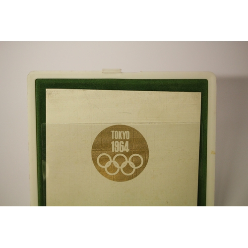 564 - Tokyo 1964 Olympics - Gold, silver, and copper commemorative medal set designed by Yusaku Kamekura a... 