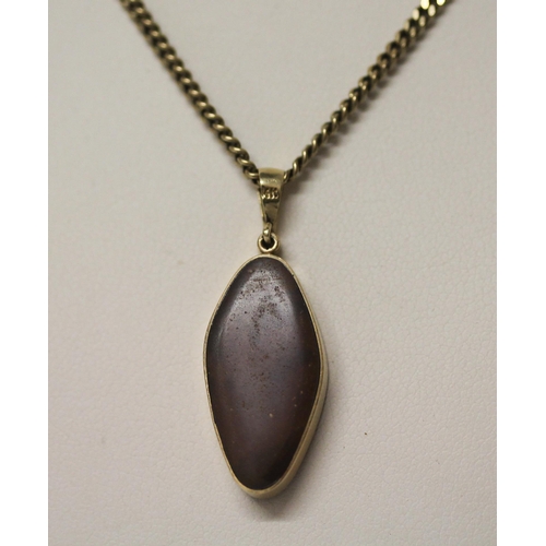 575 - An Australian boulder opal pendant, on  diamond set 14k gold setting,  on a 9ct yellow gold chain. C... 