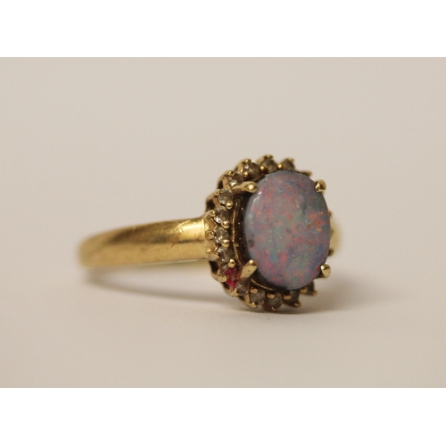 579 - Australian boulder opal and diamond oval cluster ring, on 14k yellow gold band, ring size T, weight ... 