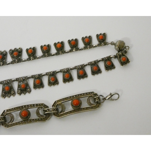 615 - Art Nouveau silver and coral filigree panel fringe  necklace and an Art Deco geometric panel white m... 