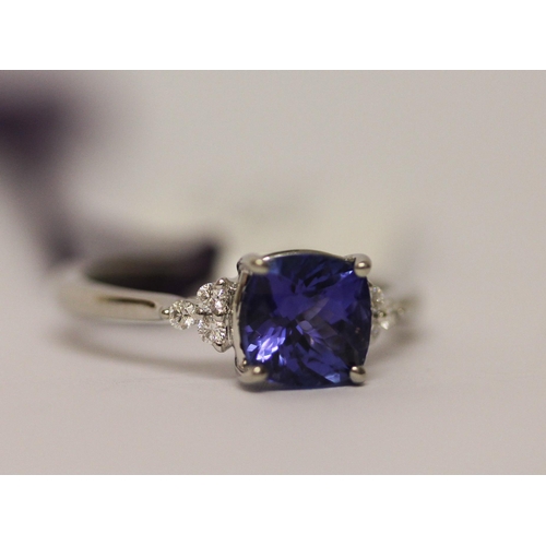 626 - Rhapsody Platinum Tanzanite and Diamond dress ring, as new with certificate, box and tags. Ring Size... 