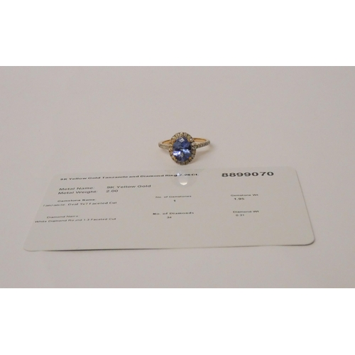 639 - 9ct gold oval tanzanite and diamond cluster ring, ring size L. As new with certificate