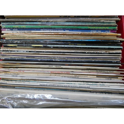 329 - Two boxes of vinyl LP records and some singles - some pop music