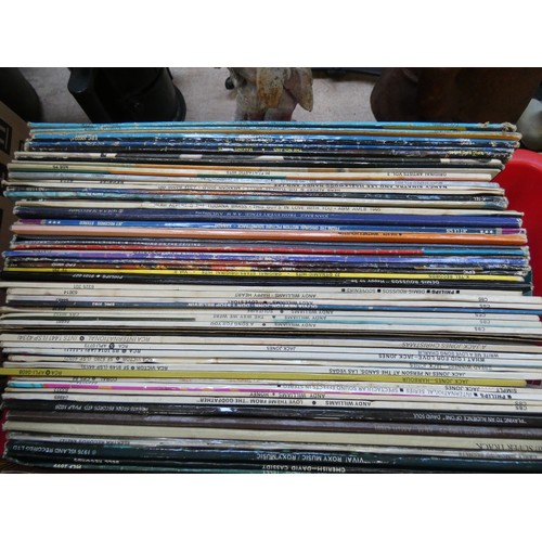 329 - Two boxes of vinyl LP records and some singles - some pop music