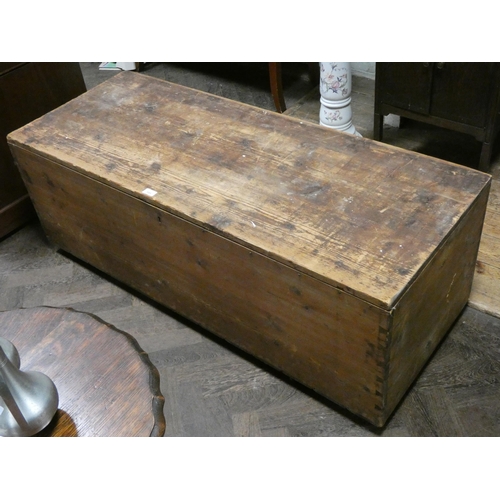 101 - A large stripped pine lift top box, 4'6 long