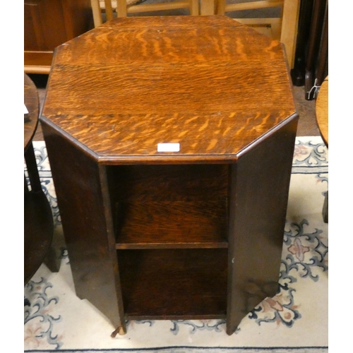 123 - A three tier octagonal oak book table