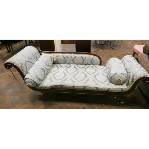 129 - A Regency Empire style mahogany and brass studded Chaise Longue with blue patterned upholstery