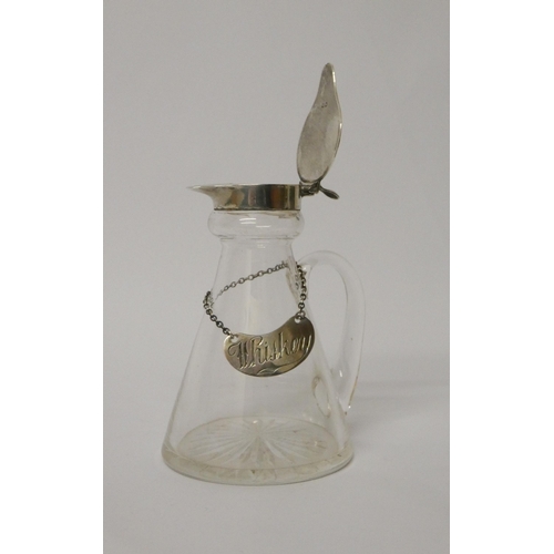 707 - An Edwardian glass whisky tot or noggin with hallmarked silver hinged lid and a silver 'Whisky' labe... 