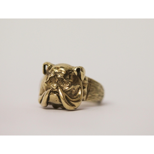 523 - A 9ct gold Bulldog motif gents ring, ring size N, weight 9.5g