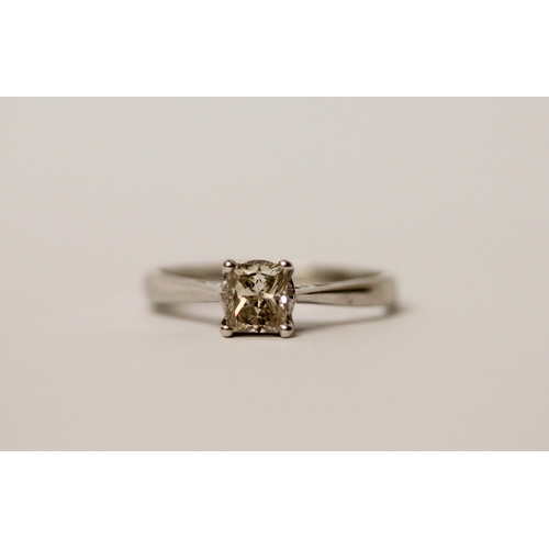 526 - A modern diamond engagement ring, the princess cut diamond weighing 0.76 carats on platinum band. Ha... 