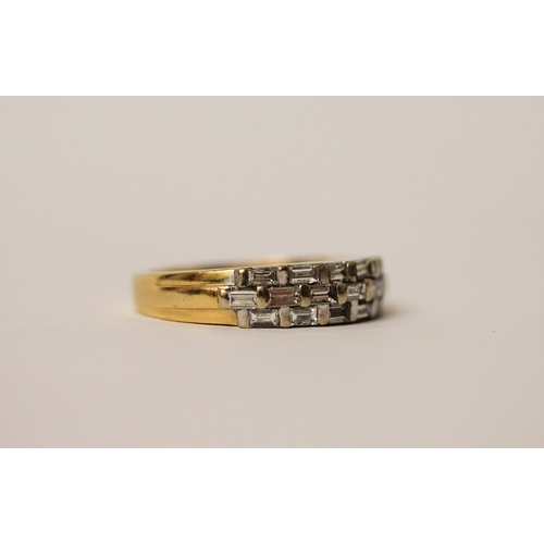 544 - Modern baguette cut diamond set half hoop eternity ring, in hallmarked 18ct gold, ring size M, weigh... 