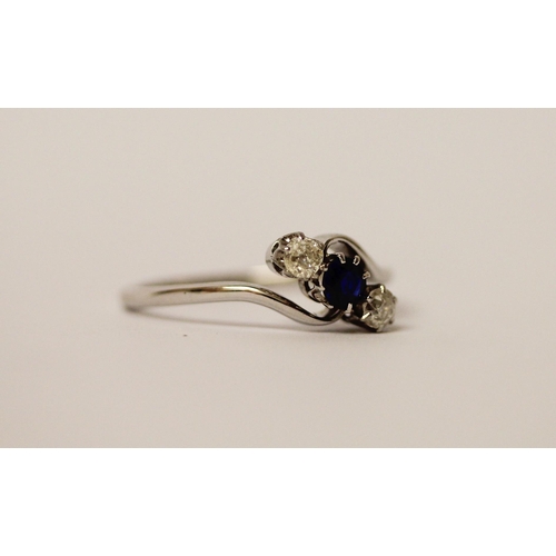 545 - A vintage sapphire and diamond three stone ring, in a twist design, on platinum band, hallmarks worn... 