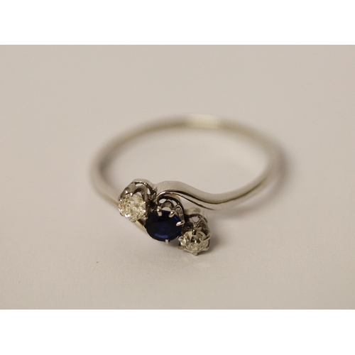 545 - A vintage sapphire and diamond three stone ring, in a twist design, on platinum band, hallmarks worn... 