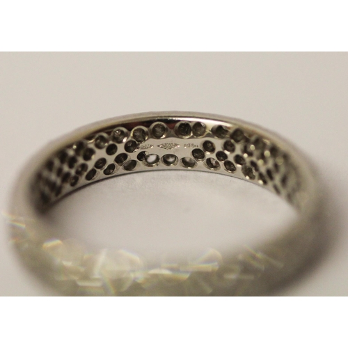 555 - A platinum pave diamond eternity ring or wedding band, fully diamond set, hallmarked, ring size J, w... 