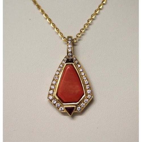 559 - A coral, ruby and diamond pendant, the central coral surrounded by brilliant cut diamonds with ruby ... 