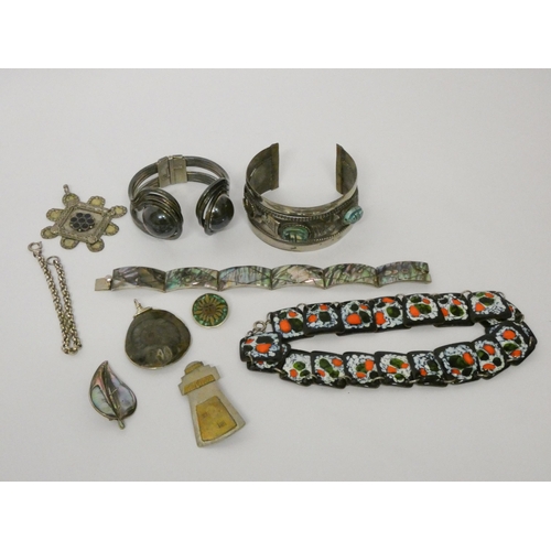 643 - Paua shell and sterling silver bracelet, brooches, chunky bangles and a polychrome enamelled collar ... 