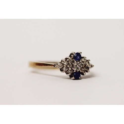 580 - A sapphire and diamond panel cluster ring, on hallmarked 9ct gold band. Ring size N, weight 2.6g