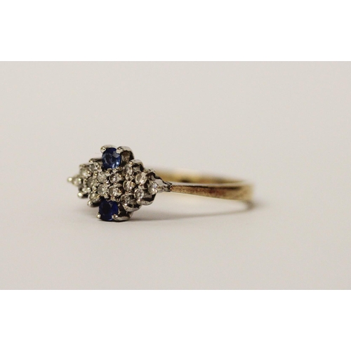 580 - A sapphire and diamond panel cluster ring, on hallmarked 9ct gold band. Ring size N, weight 2.6g