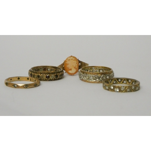 582 - A collection of five 9ct gold ladies rings - four stone set eternity rings and a cameo dress ring. G... 