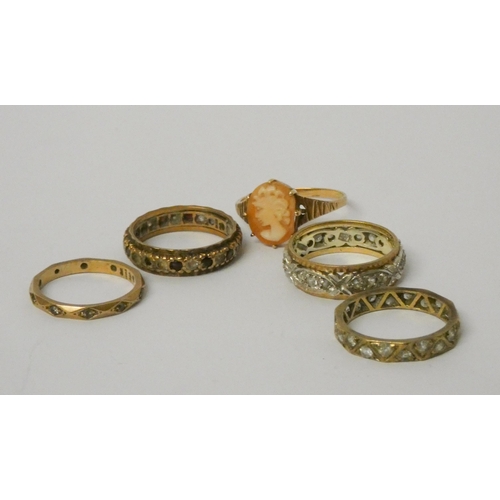 582 - A collection of five 9ct gold ladies rings - four stone set eternity rings and a cameo dress ring. G... 