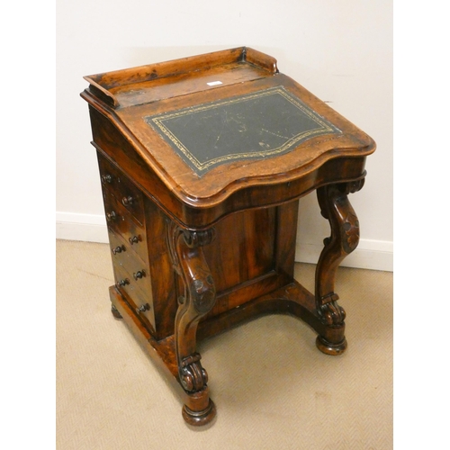 166 - A Victorian walnut davenport with galleried top, 22