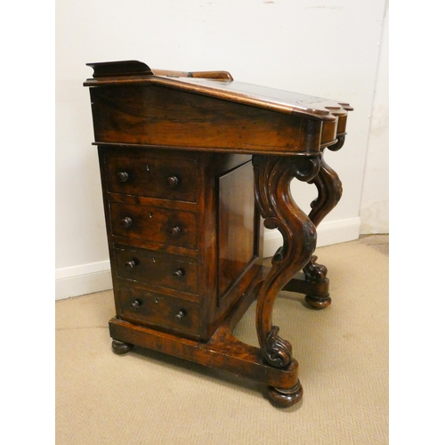 166 - A Victorian walnut davenport with galleried top, 22