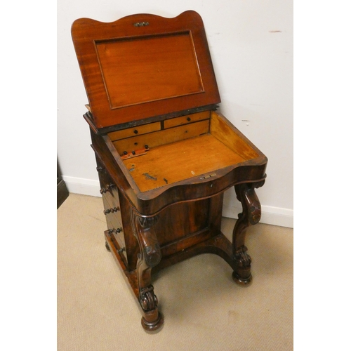 166 - A Victorian walnut davenport with galleried top, 22