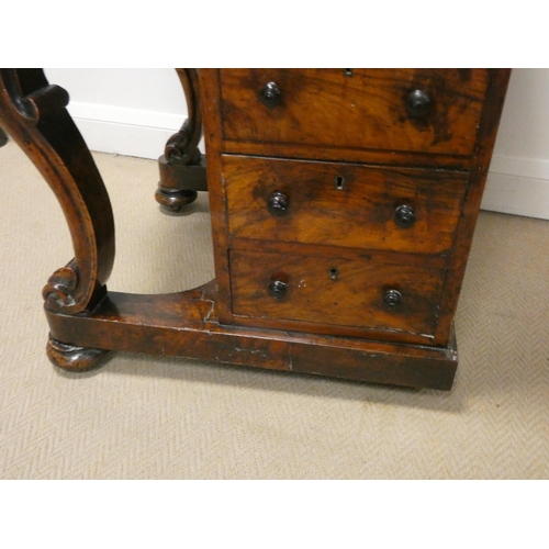 166 - A Victorian walnut davenport with galleried top, 22