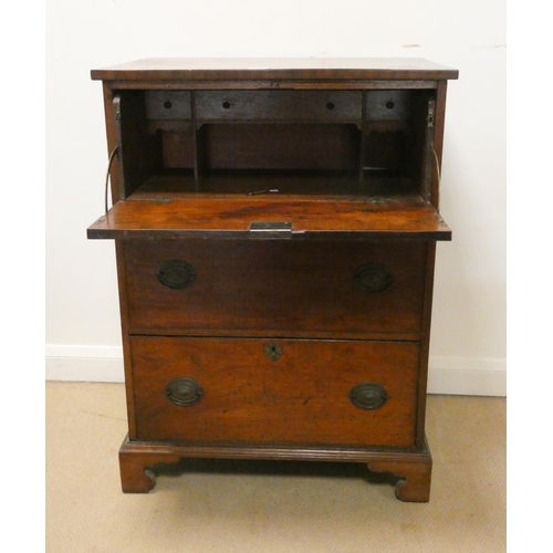 178 - A late Georgian mahogany secretaire chest of three drawers with cross banded top standing on bracket... 