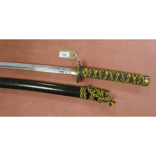 181 - 20th Century Japanese Samurai Wakizashi sword. Ray skin grip with rope binding, unsigned tang, pierc... 