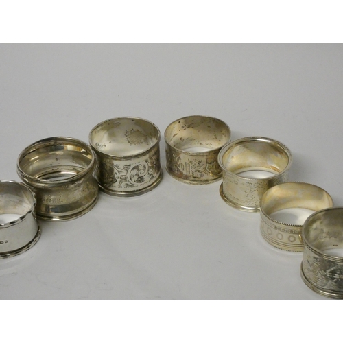 732 - A collection of eight various antique silver napkin rings. 5.3 troy ounces