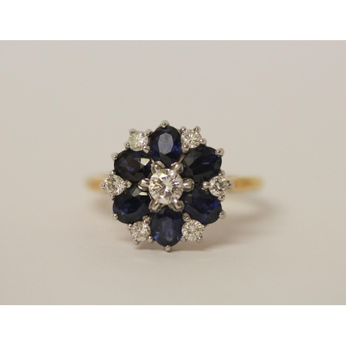 738 - An 18ct gold diamond & sapphire circular cluster ring set with seven Brilliant Cut Diamonds & Six ov... 