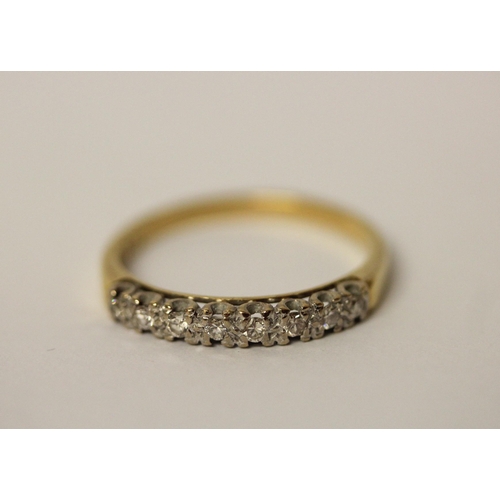 741 - An 18ct yellow gold half hoop eternity ring set with eight brilliant cut diamonds. Ring size P, Weig... 