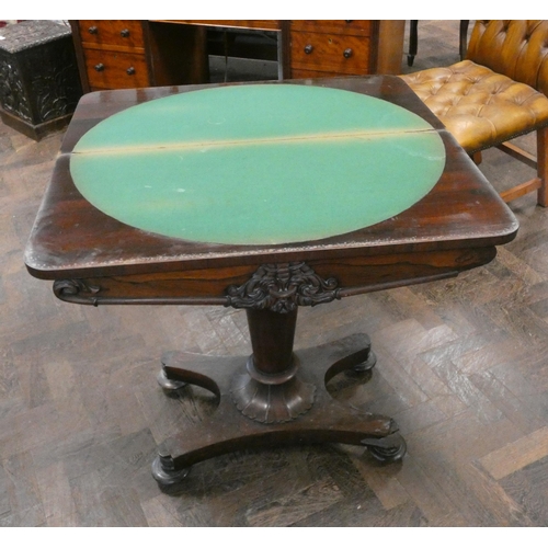 155 - A Victorian rosewood folding top card table on pillar and platform base, 3' wide