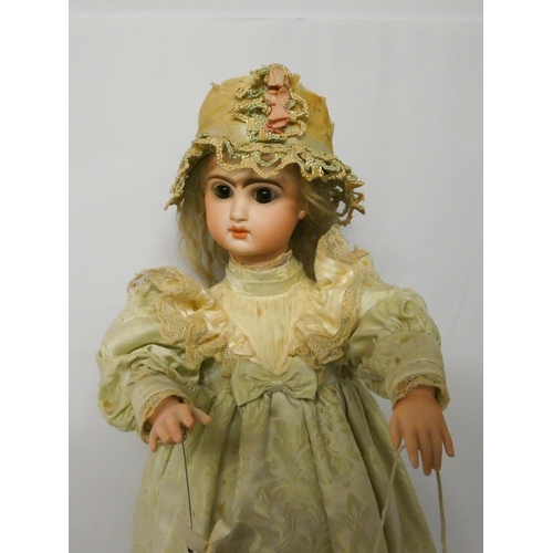 457 - A French musical  Automaton by Leopold Lambert, c. 1895 With Jumeau bisque character head stamped in... 