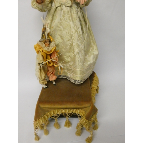 457 - A French musical  Automaton by Leopold Lambert, c. 1895 With Jumeau bisque character head stamped in... 