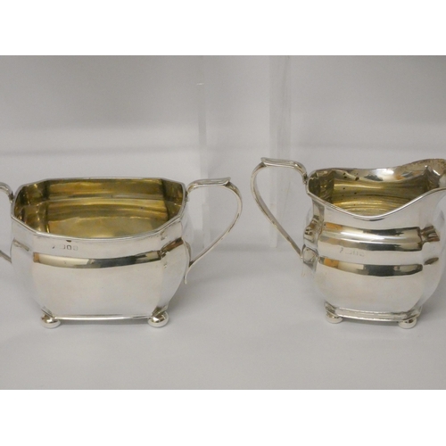 735 - A four piece hallmarked silver tea and coffee service, with ebony handles, hallmarked London 1957, g... 