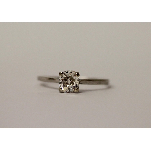 763 - A solitaire diamond ring, set with an old cut oval diamond weighing 0.80 carats, in platinum claw se... 