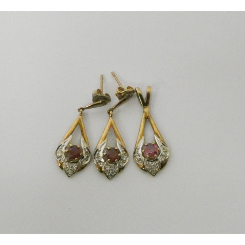 769 - A modern ruby and diamond pendant with matching drop earrings, in 9ct yellow gold