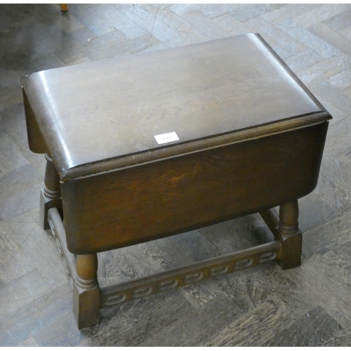 116 - A small antique style drop leaf coffee table