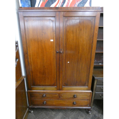 12 - A late 19th century linen press style wardrobe fitted two short and one long drawer in the base