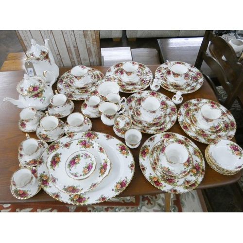 125 - A Royal Albert Old Country Roses dinner service, place setting for six, coffee and tea service