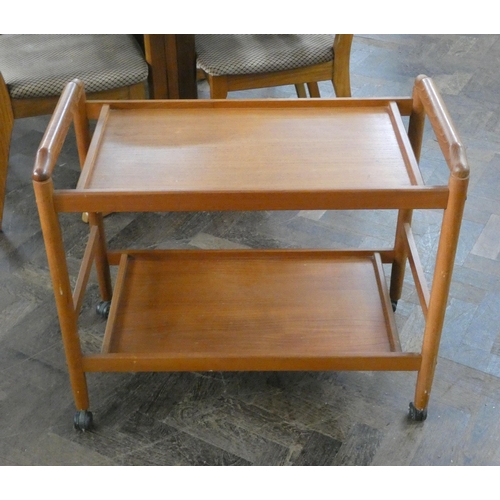 142 - A retro teak two tier tea trolley