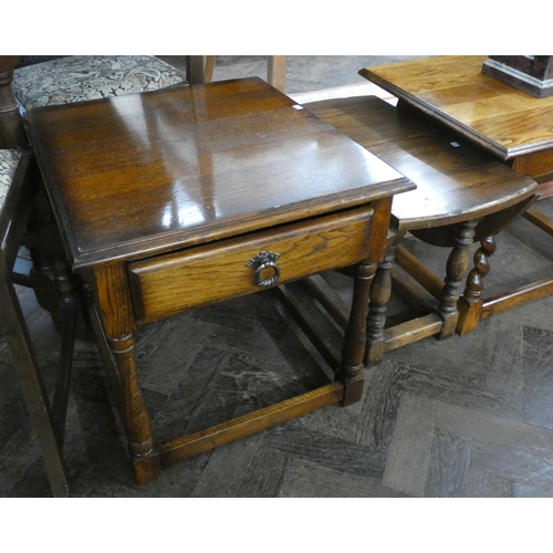 147 - A square oak side table fitted one drawer on turned legs together with a small oak drop leaf coffee ... 