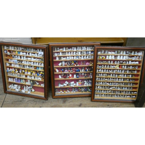 152 - Three cased wall mounting displays of modern collectors bone china thimbles