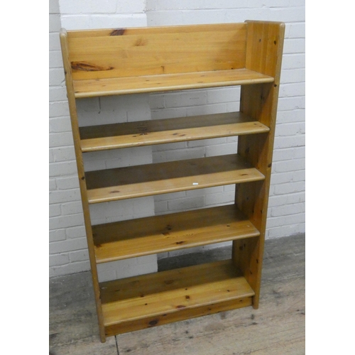 153 - A modern varnished pine thick shelf bookcase