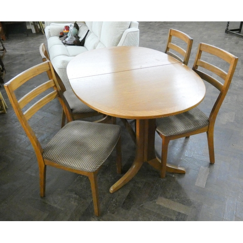 157 - A modern oval teak extending dining table and four matching chairs