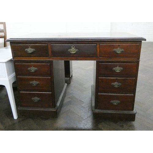 163 - Late Victorian mahogany kneehole pedestal desk fitted nine drawers in the partners style with cupboa... 